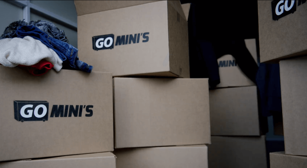 A stack of Go Mini's moving boxes inside a storage container