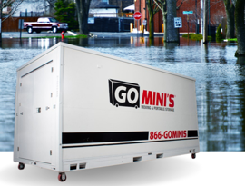 Go Mini's container surrounded by flooded water