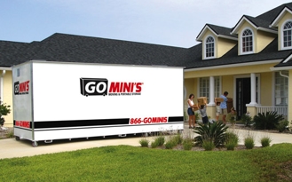 Go Mini's portable storage container in a homeowners driveway.