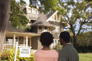 A couple looking at an open house.