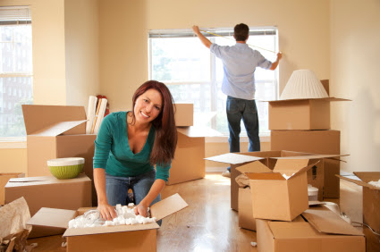 Happy couple unpacking Happy couple unpacking