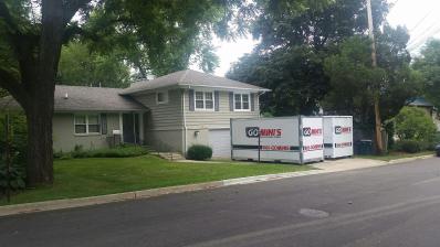 two go minis units in front of house