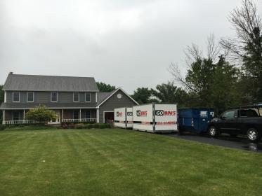 two go minis units on driveway with truck