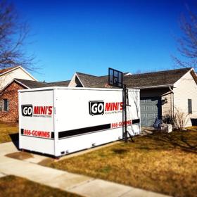 go minis unit on driveway with basketball hoop