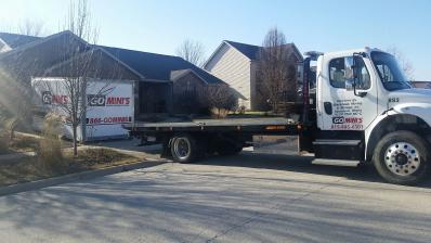 go minis unit on driveway with truck