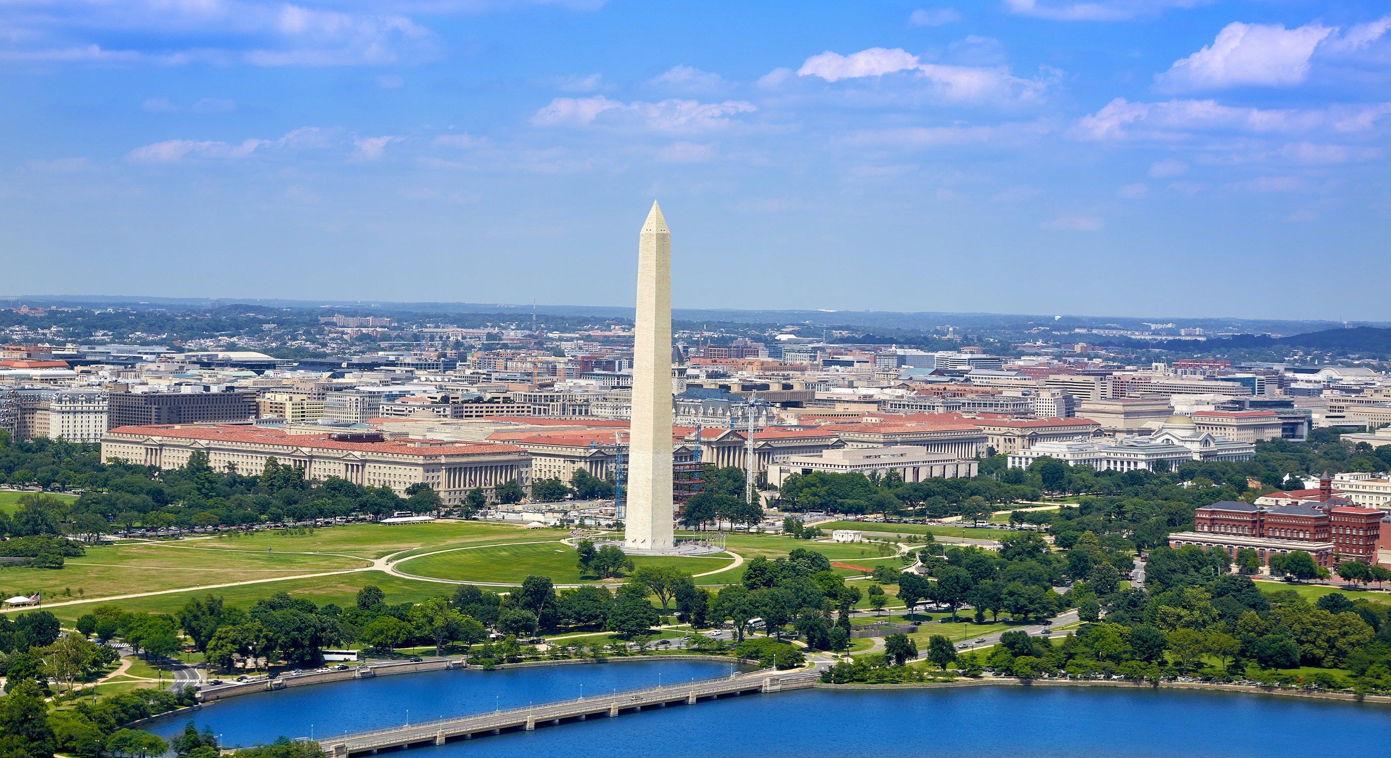 The iconic Washington Monument obelisk viewed from across the Potomac River in Northern Virginia
