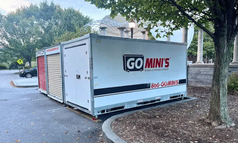 portable storage containers pods in commercial parking lot for business use